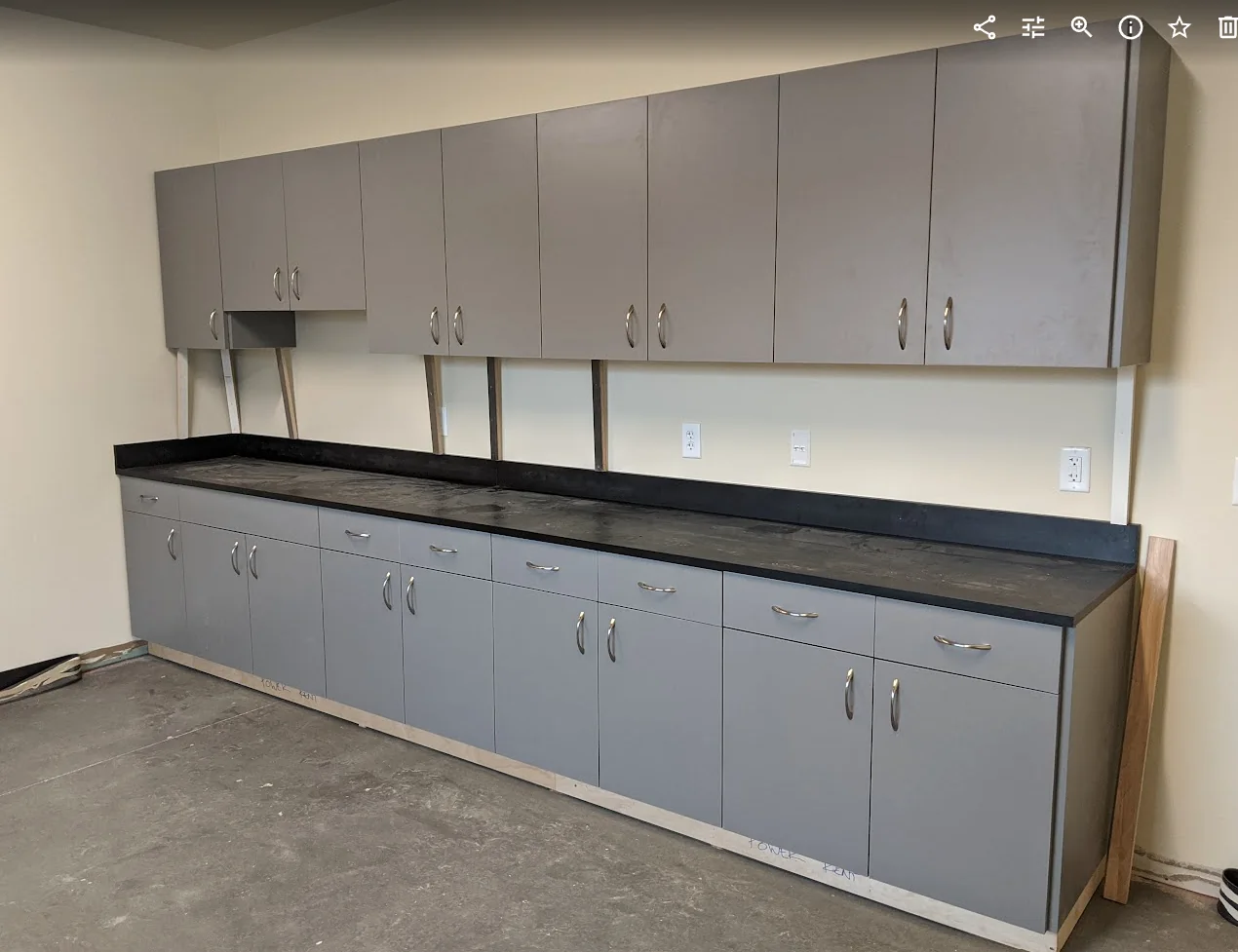 Long wall of gray cabinets